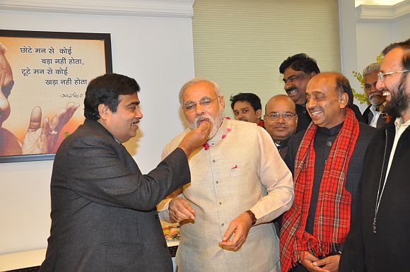 Nitin Gadkari feeds Narendra Modi a ladoo to celebrate his 2012 election victory in Gujarat.