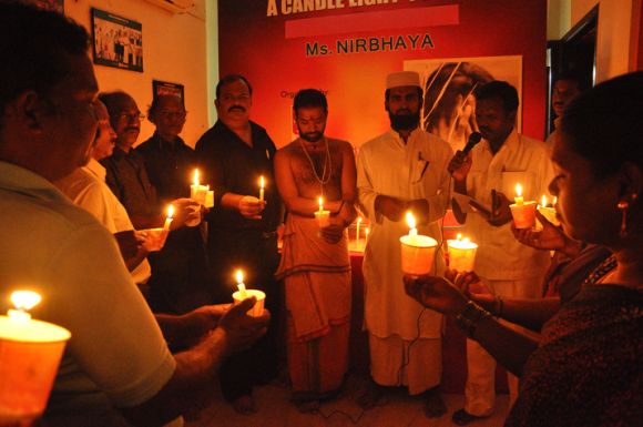 Members of the Indian Community Welfare Organisation hold a candle light prayer meeting in Chennai
