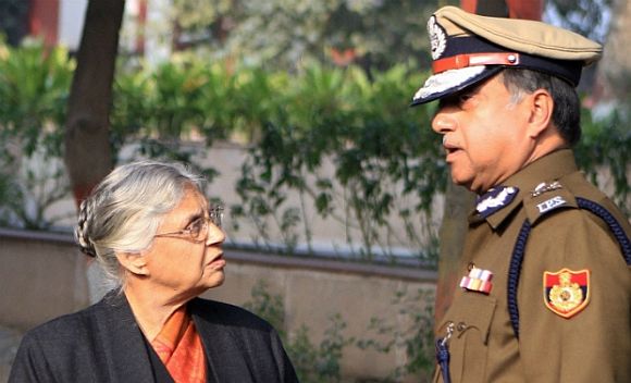 Delhi Police Commissioner Neeraj Kumar with Chief Minister Sheila Dikshit