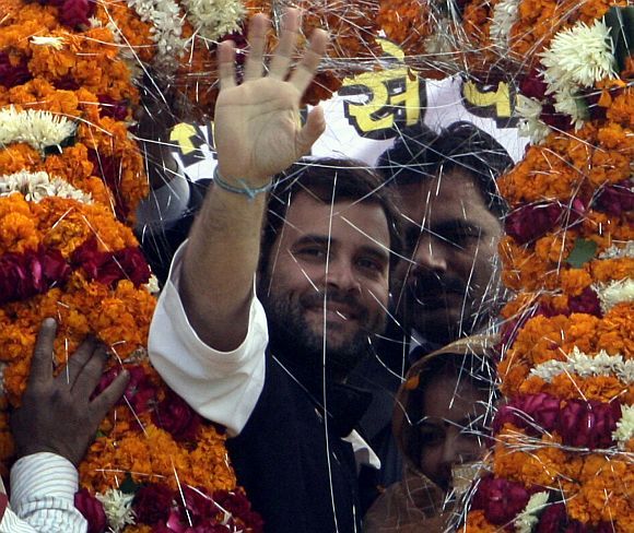 Rahul Gandhi greeted by Congress workers as he arrives to address a campaign rally in UP