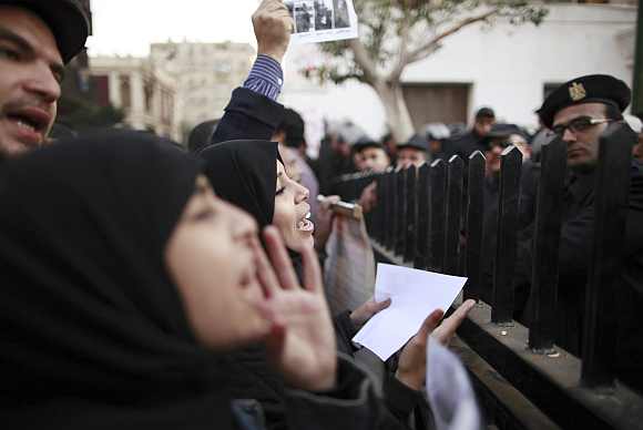 Demonstrators take part in a protest condemning the deaths that happened on Wednesday at Port Said stadium