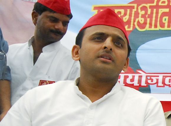 Thanks to the Congress going soft on Akhilesh Yadav, above, his wife Dimple and father Mulayam Singh have not been affected in the last five years