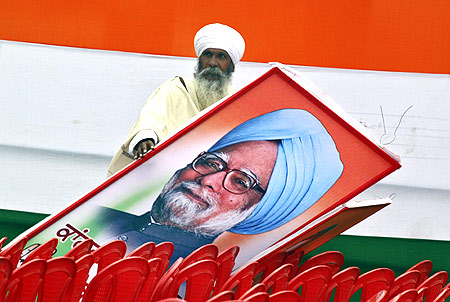 A Congress supporter with Prime Minister Manmohan Singh after an election rally in Punjab
