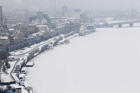 A view of the frozen River Dnieper in an air temperature around minus 18 degree Celsius in snow covered central Kiev