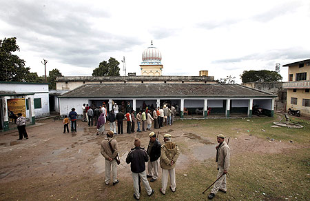 Voters outside a polling station in Ayodhya, UP