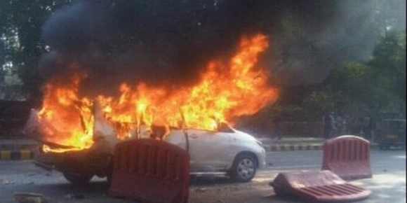 An Israel diplomat's car goes up in flames after an explosion in New Delhi on Monday