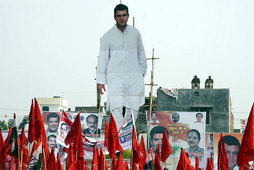 A giant cut-out of Rahul Gandhi on the roof of a house near the venue of a Congress campaign rally in Allahabad