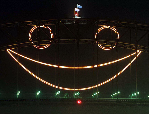 A giant smile lights up Sydney's Harbour Bridge