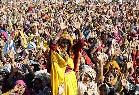 Supporters of Mayawati, Uttar Pradesh's chief minister, greet her during an election rally in Allahabad