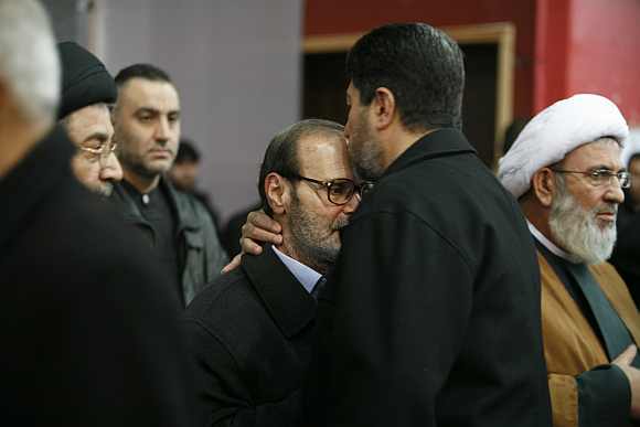 Fayez Moughniyeh, father of Lebanon's Hezbollah assassinated commander Imad Moughniyeh, receives condolence during his son's funeral in Beirut on February 14, 2008