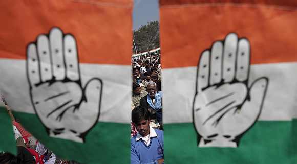 Supporters of the Congress atten an election campaign rally at Unnao district in Uttar Pradesh