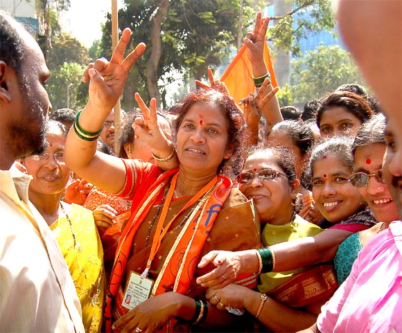 A Shiv Sena winning candidate celebrates her victory