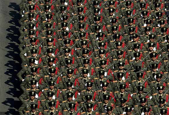 Members of the Iranian Army parade during a ceremony in Tehran