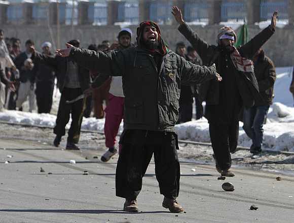 Afghan men shout anti-US slogans during a protest in Kabul