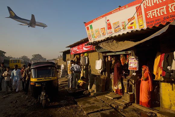 Slums border Mumbai airport