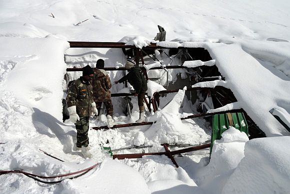 Army personnel during rescue operations at avalanche-hit Sonamarg on Monday