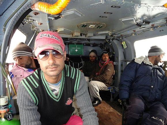 Civilians being evacuated to safer areas in an army helicopter after they were rescued from the avalanche-hit Sonamarg