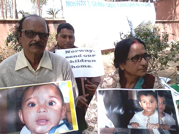 Family members of the Avigan and Aishwariya Bhattacharya at the protest in New Delhi
