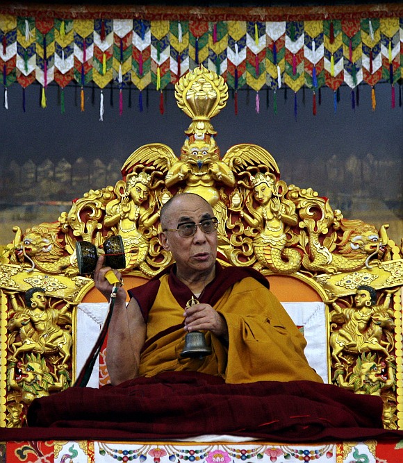 Tibetan spiritual leader the Dalai Lama speaks during a teaching session on the first day of the Kalachakra festival in Bodhgaya