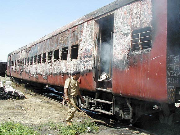The burnt carriage of a train after the Godhra incident
