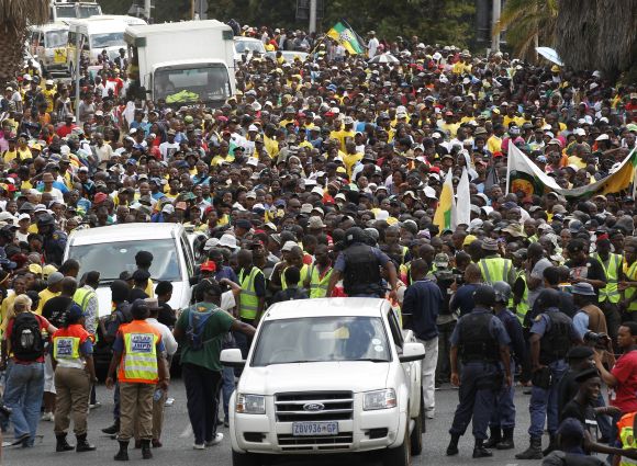 African National Congress Youth League supporters take part in a march in Johannesburg