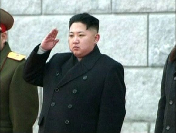 North Korea's new leader Kim Jong-un salutes during the funeral of late North Korean leader Kim Jong-il in Pyongyang