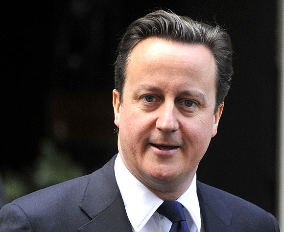 Britain's Prime Minister David Cameron leaves Downing Street in central London