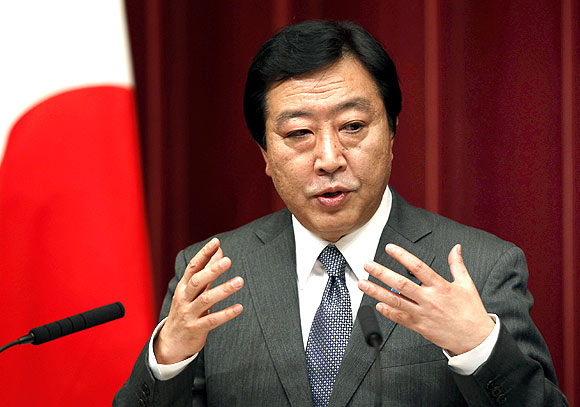 Japan's Prime Minister Yoshihiko Noda speaks at a news conference in Tokyo