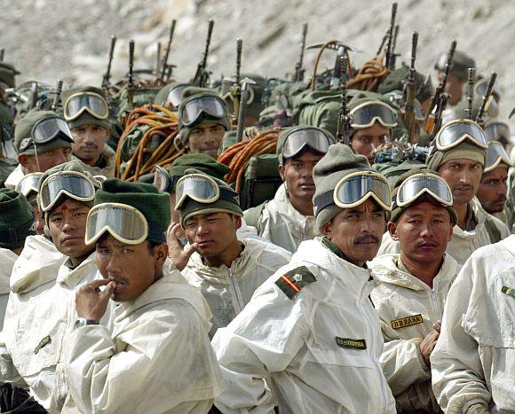 Indian soldiers at base camp after returning from training on the Siachen Glacier