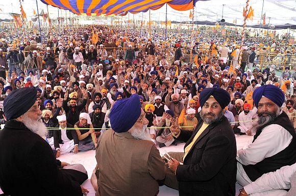 Punjab Chief Minister Parkash Singh Badal and his son Deputy Chief Minister Sukhbir Singh Badal.