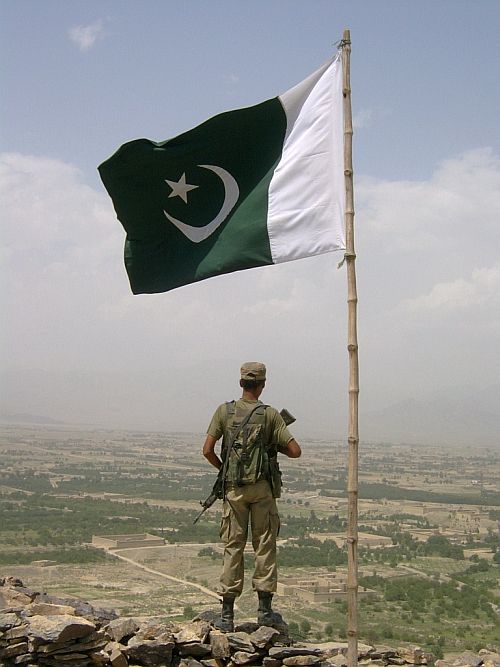 A Pakistan soldier stands guard at a checkpost