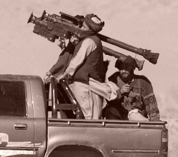 File picture of Taliban soldiers with an American Stinger missile launcher