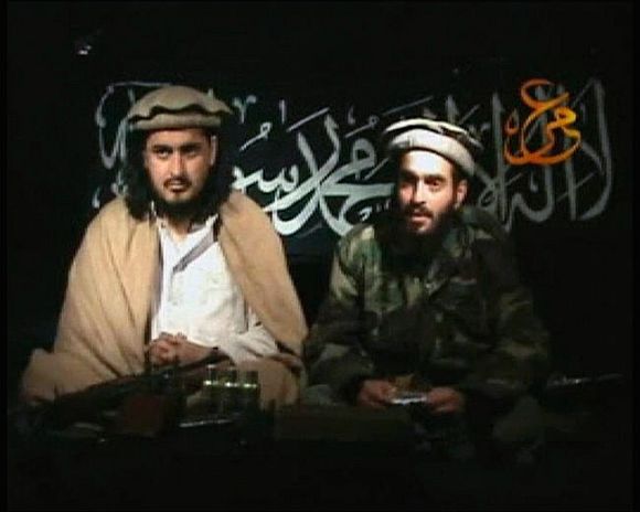 Video grab shows Hakimullah Mehsud, left, sitting beside a man who is believed to be Humam Khalil Abu-Mulal Al-Balawi, the suicide bomber who killed several CIA agents in Afghanistan