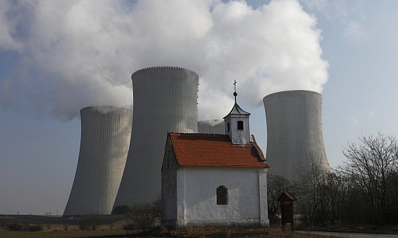 A chapel is seen in front of the cooling towers of the Czech nuclear power plant at Dukovany, 200 kilometers east from Prague