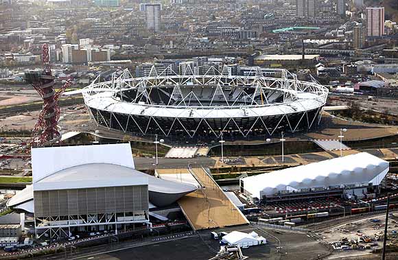An aerial view shows the London 2012 Olympic Games Olympic Stadium, Aquatics Centre, Water Polo and the Orbit, at the Olympic Park in London