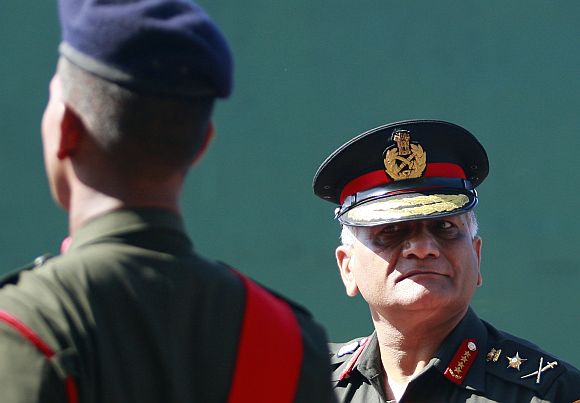 Army Chief General V K Singh inspects Sri Lankan soldiers during a military ceremony at the army headquarters in Colombo