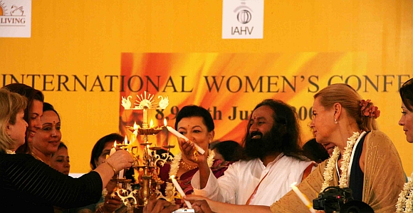 Art of Living Founder, Sri Sri Ravi Shankar lights the inaugural lamp along with prominent speakers during the 2009 conference