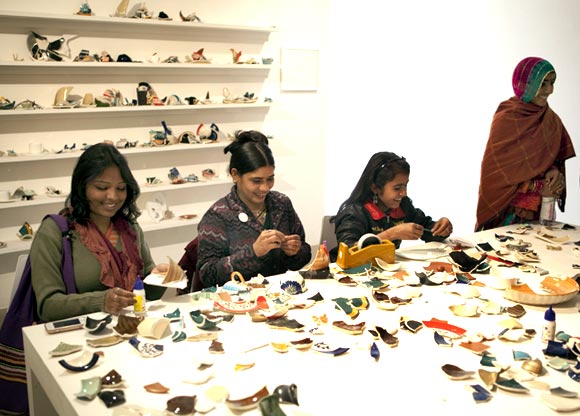 Visitors try their hand at Mend Piece