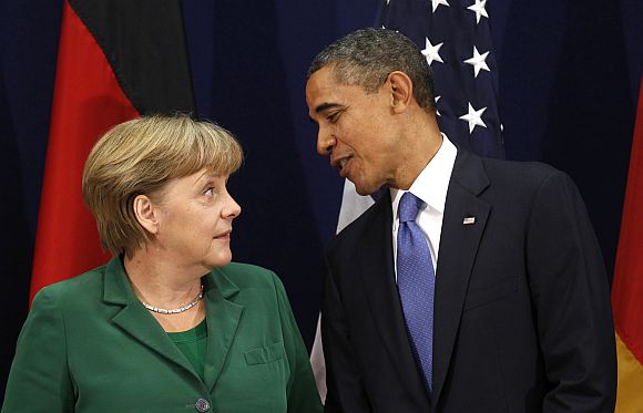 Obama meets Merkel at the 2011 G20 in Cannes, France