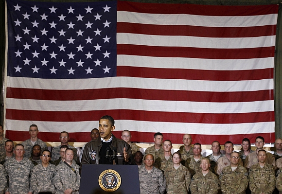 US President Barack Obama meets with troops at Bagram Air Base on December 3, 2010