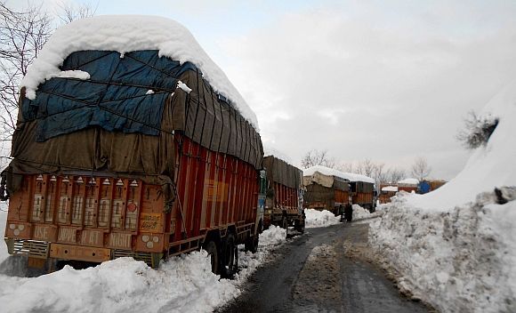 Stranded goods trucks near Jawahar Tunnel along Jammu Srinagar highway on Friday