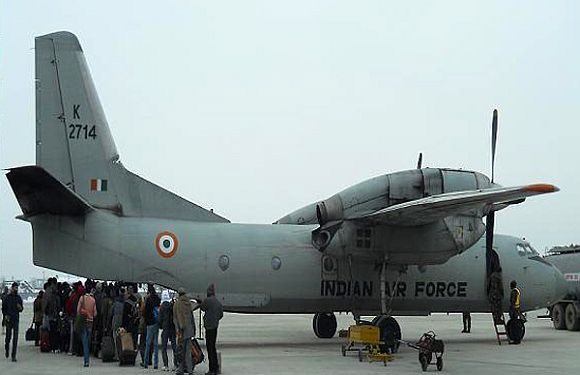 Stranded passengers board a special IAF flight, on Saturday