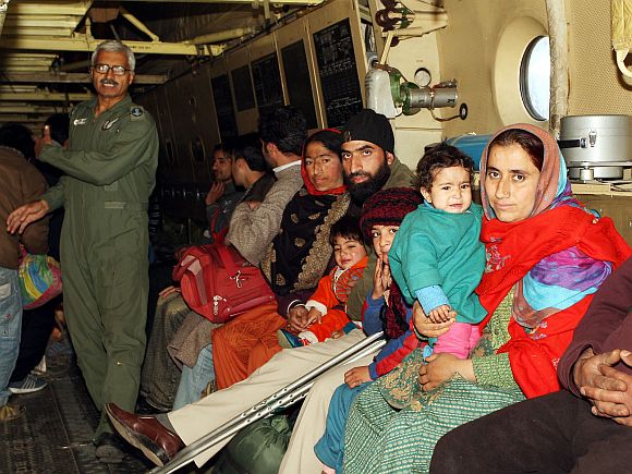 Rescued civilians inside the IAF AN-32 aircraft