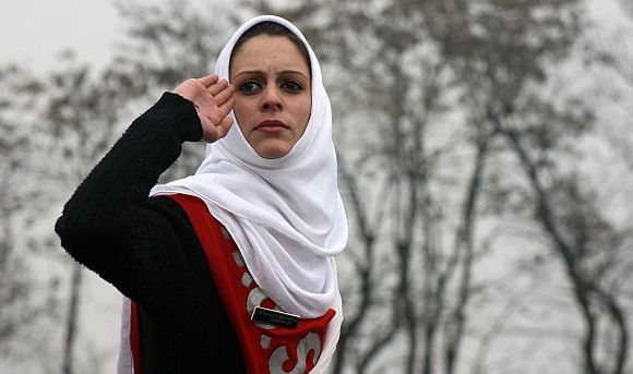 A Kashmiri girl salutes