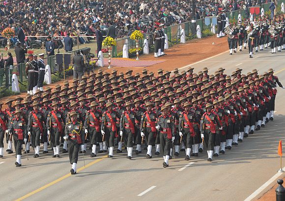 Assam Rifles marching contingent passes through the Rajpath