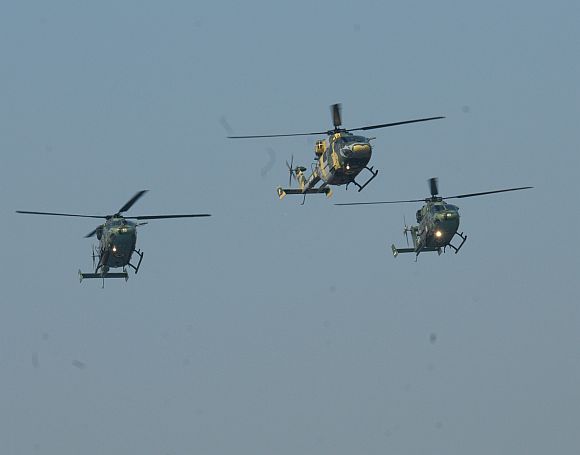 Indian Army's Advanced Light Helicopters fly past over Rajpath
