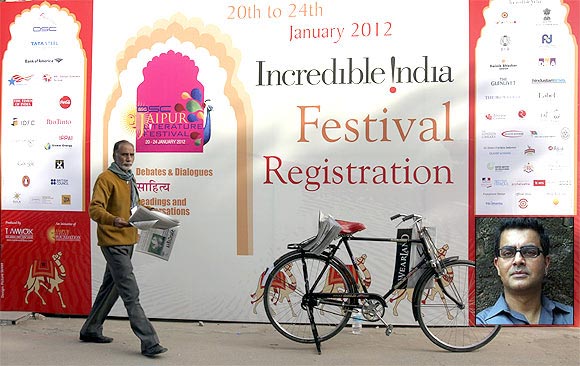 A billboard for the Jaipur Literary Festival. Inset, writer Amitava Kumar