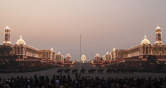 The Indian Defence Ministry (L), Home Ministry (R) and Presidential Palace (C) buildings are illuminated at the Beating the Retreat ceremony in New Delhi
