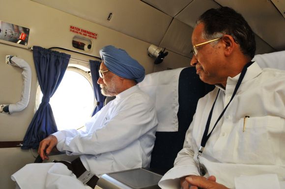 PM Singh with Assam CM Gogoi during the aerial survey of flood-affected districts on Monday