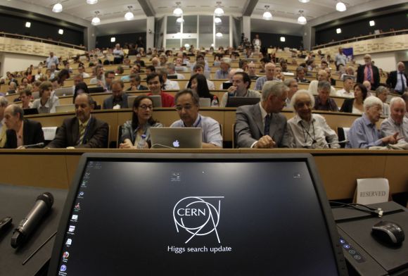 A computer screen is pictured before a scientific seminar to deliver the latest update in the search for the Higgs boson at the European Organization for Nuclear Research (CERN) in Meyrin, near Geneva